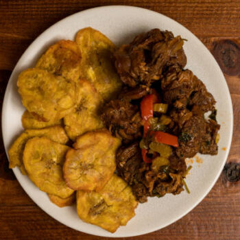 Stewed goat with yellow rice