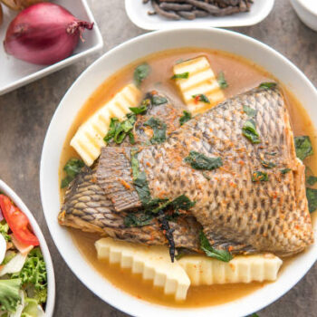 African national food dish. Nigerian Grilled meat and chicken dish. Nigerian Fish curry. Home-made plantain with Jollof Rice. Nigerian Meal Jelly Food. Rice and curry. Grilled African fish dish meal and Plantain & banana meal dish.